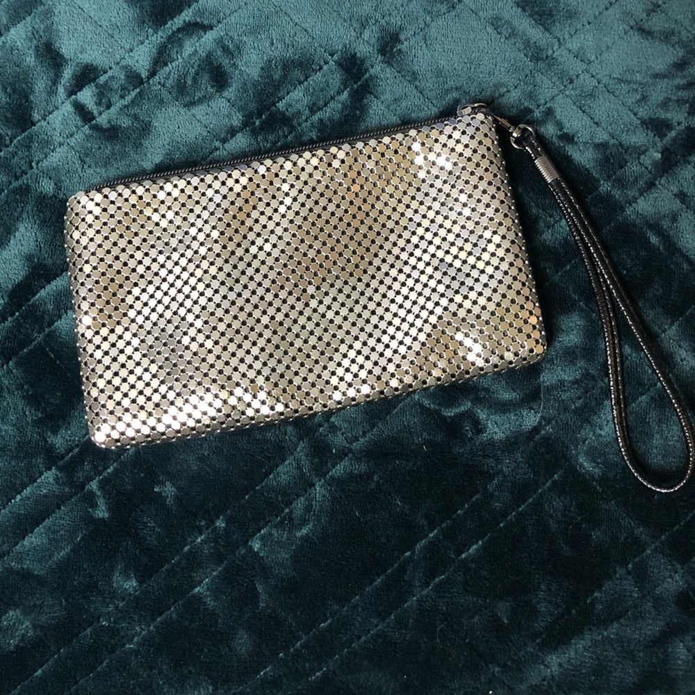 New York & Co silver shimmery clutch/makeup bag.